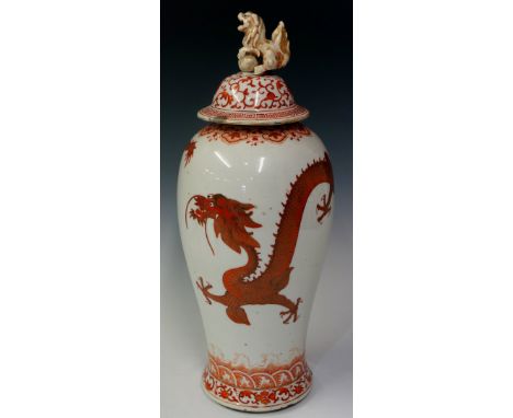 A Chinese porcelain baluster vase and cover painted to the body  in iron red and gilt with The Dragon Chasing The Flaming Pea