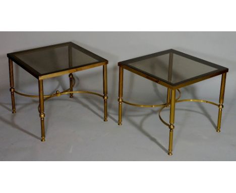 A pair of reproduction brass framed square lamp tables with smoked glass tops on tapered fluted legs joined by an X-stretcher