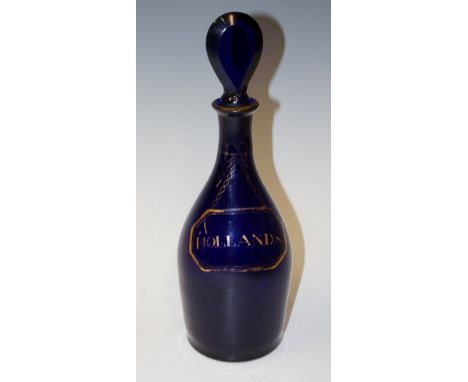 A Regency blue glass mallet shaped decanter and stopper the body detailed in gilt with a faux label inscribed "Hollands" with