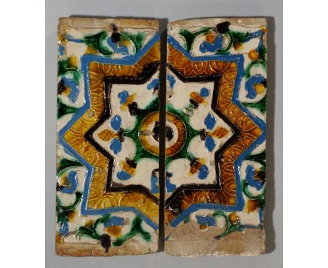 Two 17th Century Spanish tiles decorated in turquoise, green, mustard and brown with a geometric medallion within stylised le