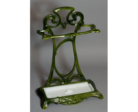 A French green enamelled Art Nouveau umbrella and walking stick stand with white enamelled drip pan, made by A. Martin Revin,
