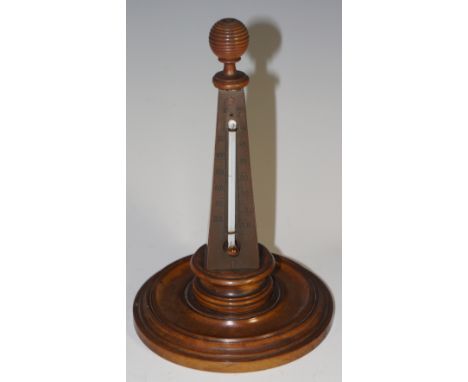 An olive wood pyramid shaped thermometer topped by turned wood reeded sphere-shaped finial, turned base, thermometer affixed 