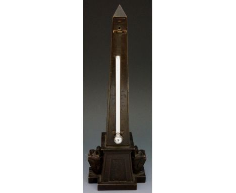 A Victorian Egyptian revival obelisk shaped thermometer cast hieroglyphics, panelled base set pair of seated figures, 26cm hi
