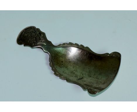 A Chinese caddy spoon of shaped design the handle foliate engraved, marked, 9cm long