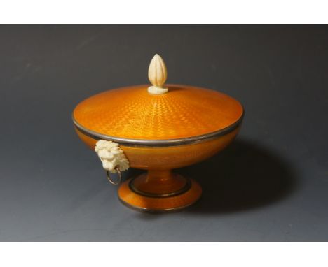 A Continental silver pedestal dish the cover and body engine turned and enamelled in a mandarin palette, ivory fluted finial 