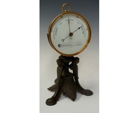 A Victorian barometer with thermometer the drum shaped brass case with white dial inscribed Stormy to Very Dry, Edinburgh and