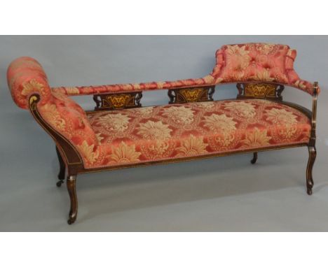 A late Victorian mahogany salon sofa inlaid throughout with ivory stringing and Art Nouveau inspired panels, upholstered back
