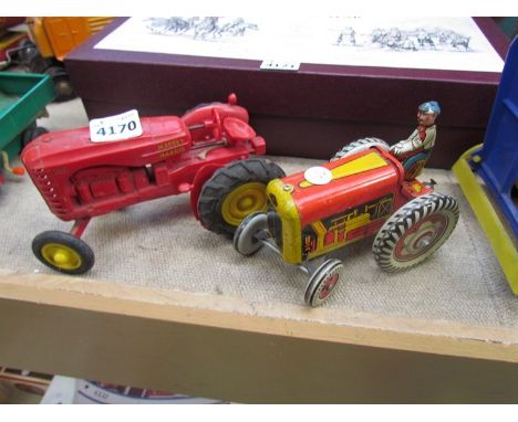 A 1950's plastic Massey Harris tractor and Mettoy tractor with driver 