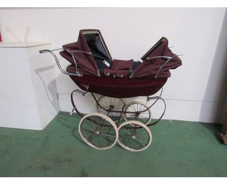 A Silver Cross double canopy dolls pram 