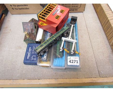 Three boxed "N" gauge coaches including Rivarossi, two unboxed inlcuding Lima and two trackside buildings 