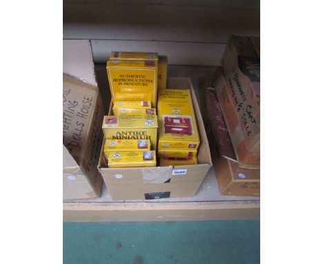 A box of boxed "Mini Mundus" dolls house miniatures including 40086 upright piano with stool and 40016 Chippendale wing chair