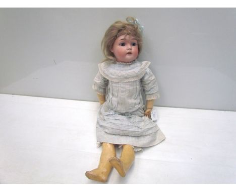 A bisque head, composition body girl doll, 52cms, head stamped K&R