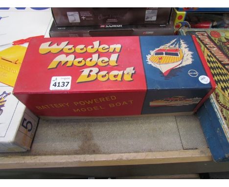 A boxed Union battery powered wooden model boat with outboard motor 