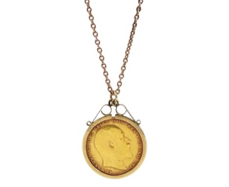 King Edward VII 1910 gold full sovereign coin, loose mounted in gold pendant, on rose gold chain, both 9ctCondition Report:Ap