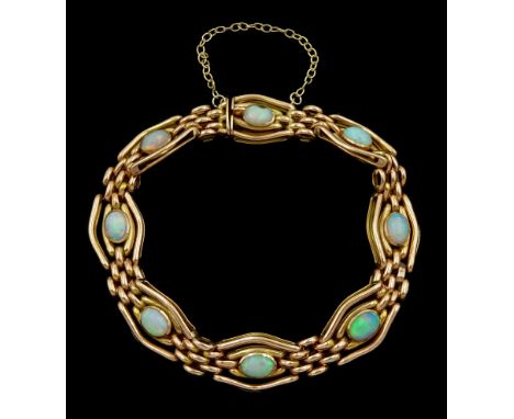 Early 20th century rose gold opal link bracelet, stamped 9ctCondition Report:Approx 13.55gm, length = 18cm, opal next to clas