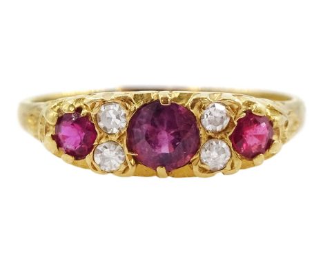 18ct gold three stone ruby and four stone round brilliant cut diamond ring, London 1975Condition Report:Approx 2.8gm, shank c