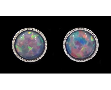 Pair of silver round opal stud earrings, stamped 925Condition Report:Diameter = 6mm, good condition