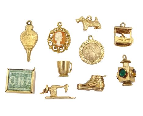 Ten 9ct gold pendant / charms including wishing well, West Highland terrier, boot, lantern, sewing machine and money boxCondi