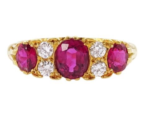 18ct gold three stone oval cut ruby and four stone round brilliant cut diamond ring, Birmingham 1972Condition Report:Approx 5