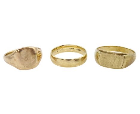 Early 20th century rose gold signet ring, later yellow gold signet ring and a gold wedding band, all 9ctCondition Report:Appr