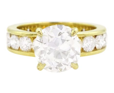 18ct gold single stone old cut diamond ring of approx 2.80 carat, with eighteen round brilliant cut diamond set shank of appr