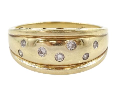 9ct gold rubover set round brilliant cut diamond ring, the gallery with pierced moon and star decoration, hallmarkedCondition