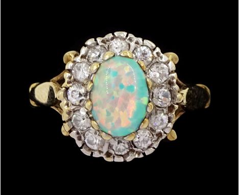 9ct gold opal and cubic zirconia cluster ring, hallmarkedCondition Report:Approx 2.65gm, size J-K