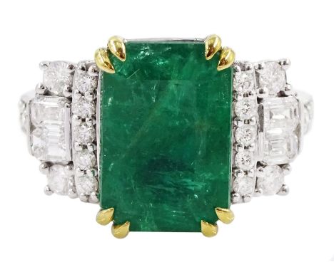 18ct white gold emerald cut emerald ring, each side set with round brilliant cut and baguette cut diamonds, with diamond set 