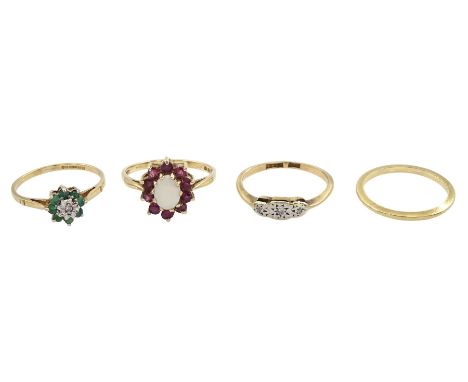 Four 9ct gold rings including opal and garnet cluster ring, emerald and diamond cluster ring, diamond chip and a wedding band