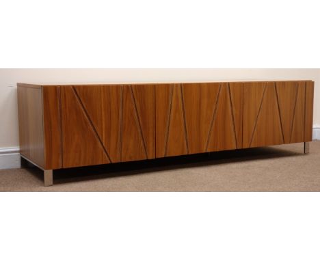 Dwell Furniture walnut low console unit, two fall front units flanking single central drawer, chrome supports, W180cm, H49cm,