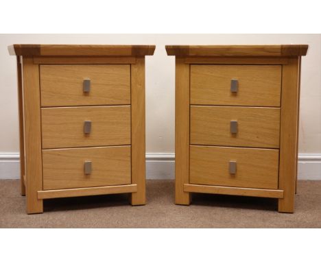 Ponsfords of Sheffield pair light oak, bedside chests, three drawers, stile supports, W50cm, H60cm, D38cm Condition Report Cl