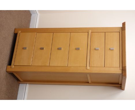 Ponsfords of Sheffield light oak pedestal chest, six graduating drawers, stile supports, W70cm, H141cm, D70cm Condition Repor