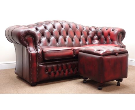 Three seat Chesterfield sofa arched back, upholstered in deep buttoned Burgundy leather, bun feet (W188cm) with similar squar