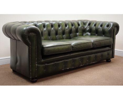 Three seat Chesterfield sofa, upholstered in deep buttoned green leather, W190cm Condition Report Click here for further imag