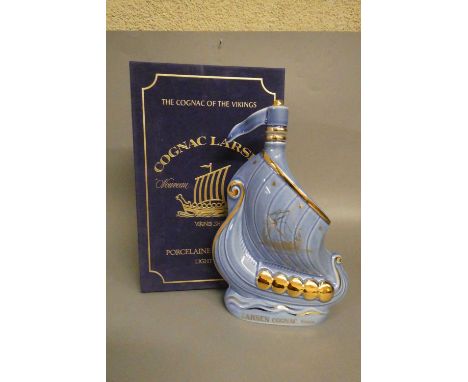 1 decanter Larsen cognac, porcelain decanter in the form of a Viking longboat by Limoges, boxed (Est. plus 24% premium inc. V