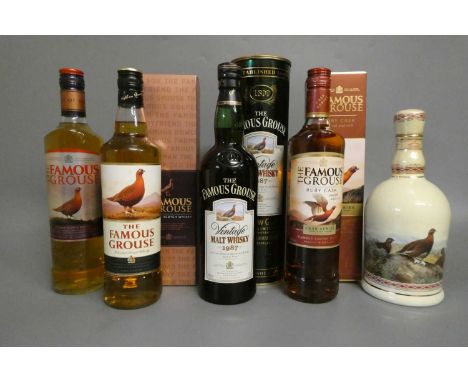 5 bottles of Famous Grouse whisky, comprising 1 Vintage 1987 malt whisky in metal tube, 1 in a Wade decanter, 1 boxed Ruby Ca