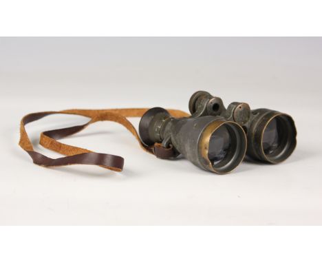 A pair of First World War period German gunner's field glasses (paint wear and overall dents).Buyer’s Premium 29.4% (includin