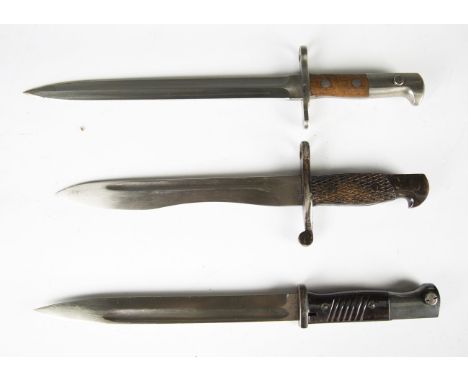 A collection of seven mid-20th century Continental and world bayonets, including a Spanish M1941 Mauser blade, length 25cm, a