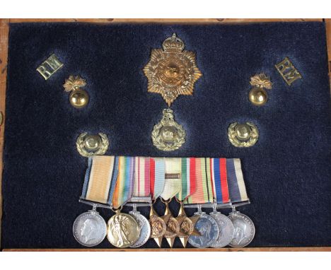 A group of nine First and Second World War period medals and related Royal Marines badges to G. Camp, comprising 1914-18 Brit