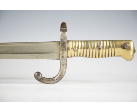 A French 1866 model Chassepot bayonet with recurved single-edged blade, blade length 57.5cm, dated 1873, steel crosspiece, ho