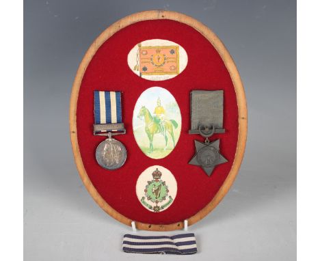 An Egypt medal, the reverse dated '1882', with bar 'Tel-el-Kebir' to '1568. Corpl W. Rainey 4th Dn Gds', and a Khedive's Egyp