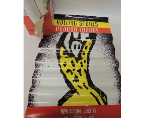 A Rolling Stones Voodoo Lounge promotional poster together with other non pop related posters
