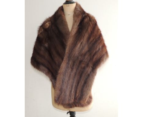 A mink stole with brown silk lining together with a light fur jacket and fur coat (3)