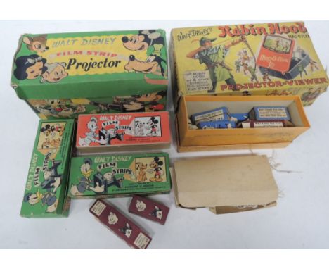 A Walt Disney Film Strip Projector by Johnsons of Hendon in original box and together with two boxes containing individual fi