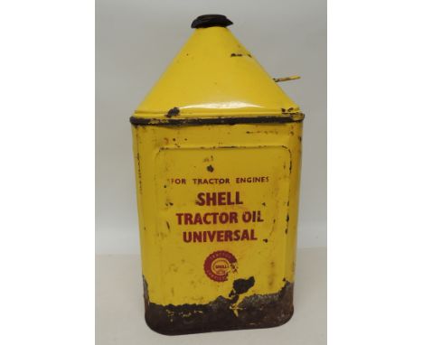 A Shell Tractor Oil Universal oil can, yellow with red lettering, 48cms high