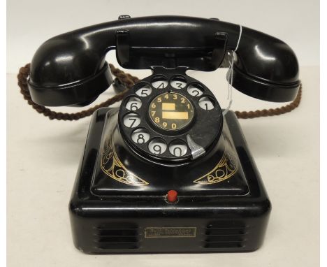 A Bell of Antwerp Gurder telephone in black painted metal case with gilt printed decoration , black dial, with red button to 