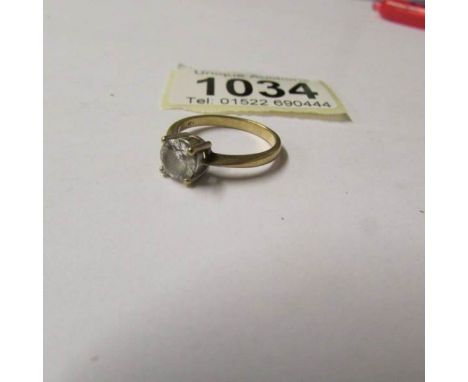 A 9ct gold ring set white stone, size M.  total weight 2.5 grams.