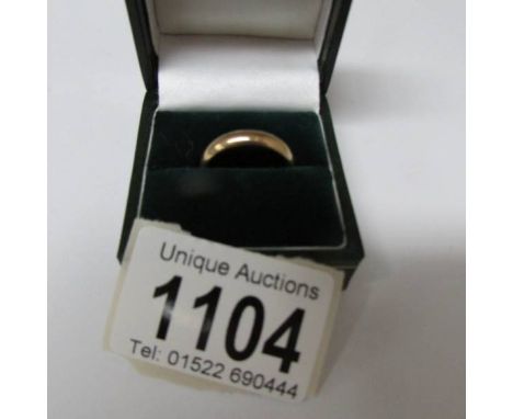 A 9ct gold wedding ring, size M.  4 grams.