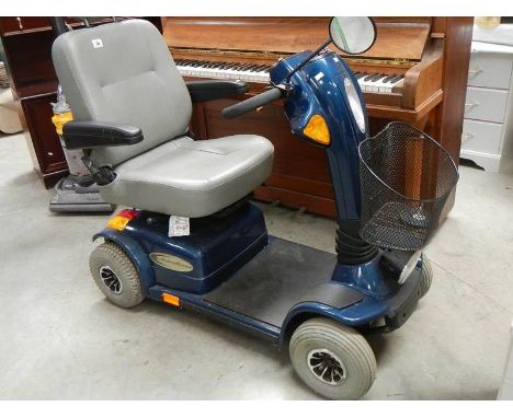 A 4 wheeled mobility scooter.