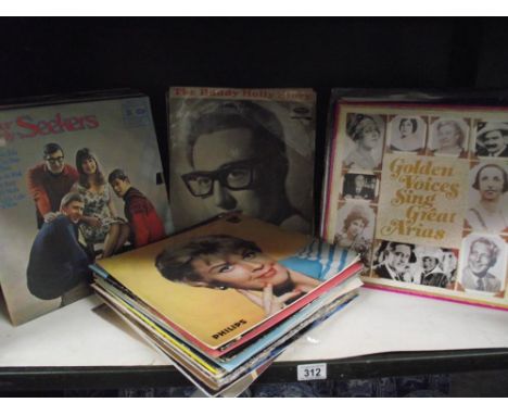 A selection of Lp vinyl records including The Seekers, Buddy Holly etc.